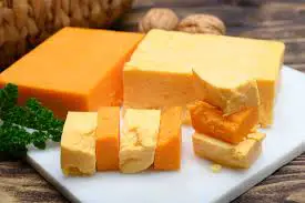 queso cheddar, usos queso cheddar, como se hace el queso cheddar, cheddar caracteristicas, origen del cheddar, como se hace el cheddar, caracteristicas cheddar