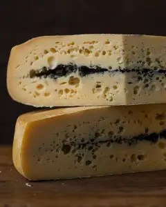 queso morbier, queso morbier usos, queso morbier ceniza, quesos franceses, queso morbier sabor, queso morbier origen, queso morbier nombre